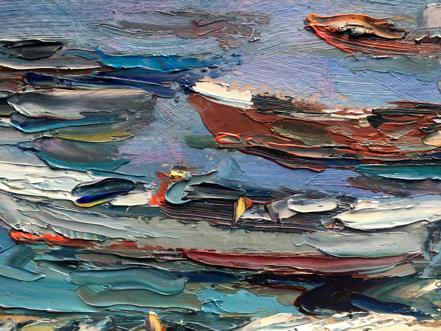 Alexander Nikolaevich Cherednichenko captures boats on the shore in his oil painting