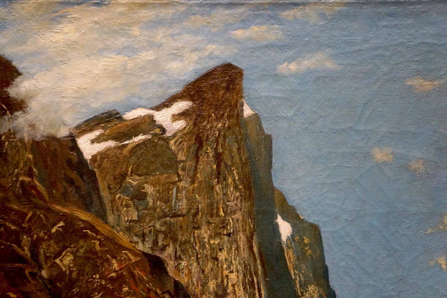 The mountainside river scene was depicted by a European artist in an oil painting