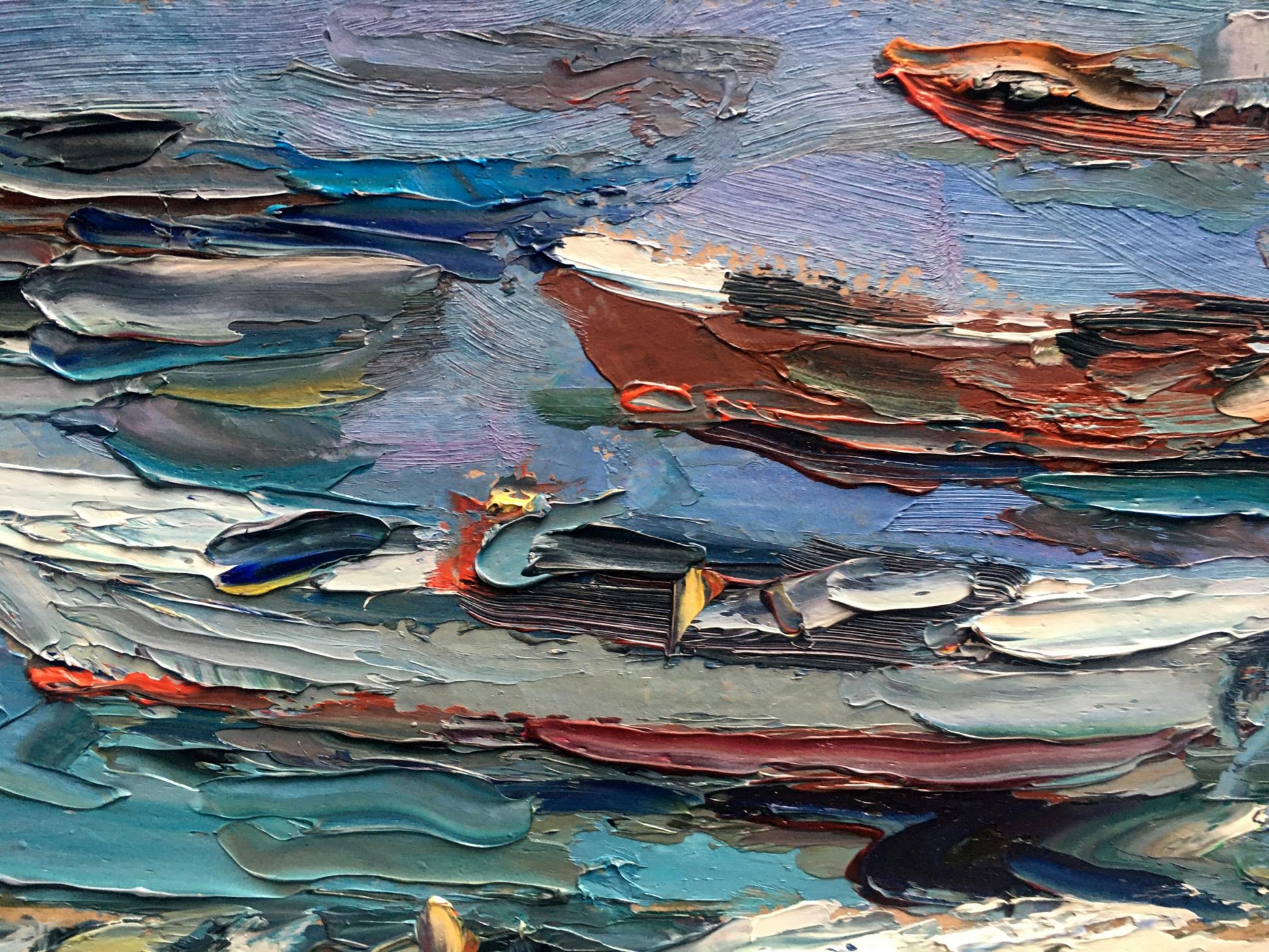 Alexander Nikolaevich Cherednichenko captures boats on the shore in his oil painting