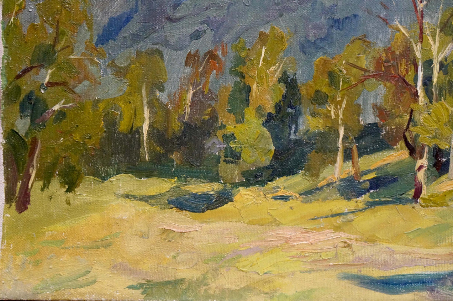 The artist behind the oil painting of mountain peaks shrouded in clouds remains unidentified