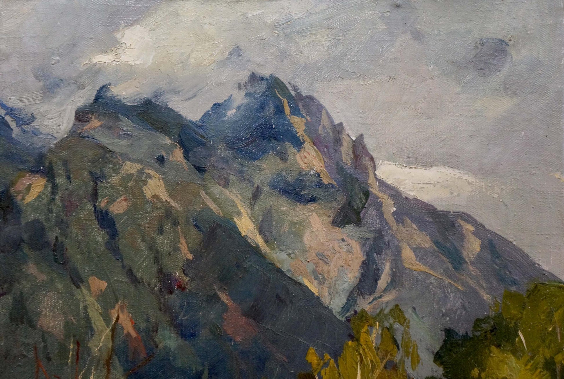 The painter of the mountain peaks amidst the clouds is unknown