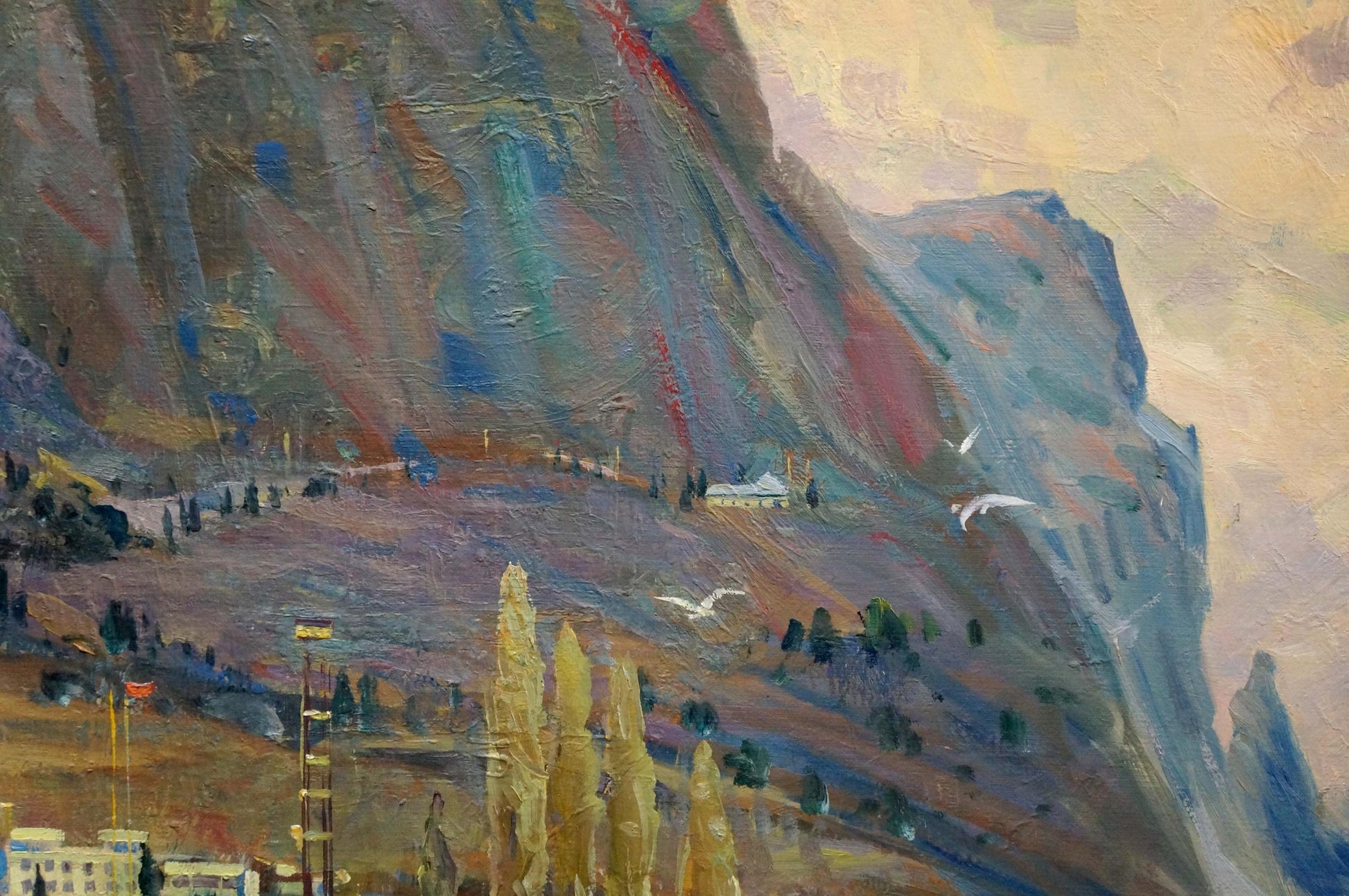 The artist behind the oil painting of mountains by the sea is unidentified
