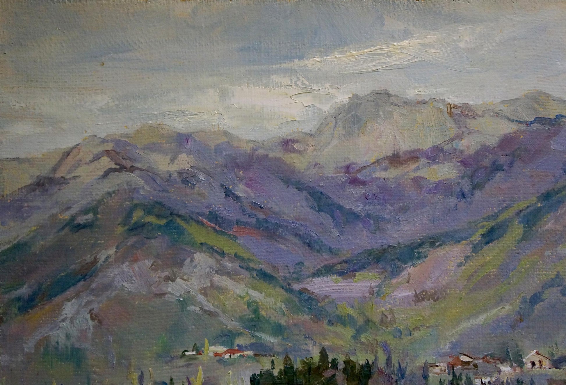 Oil painting of a city amidst mountainous terrain by an unknown artist