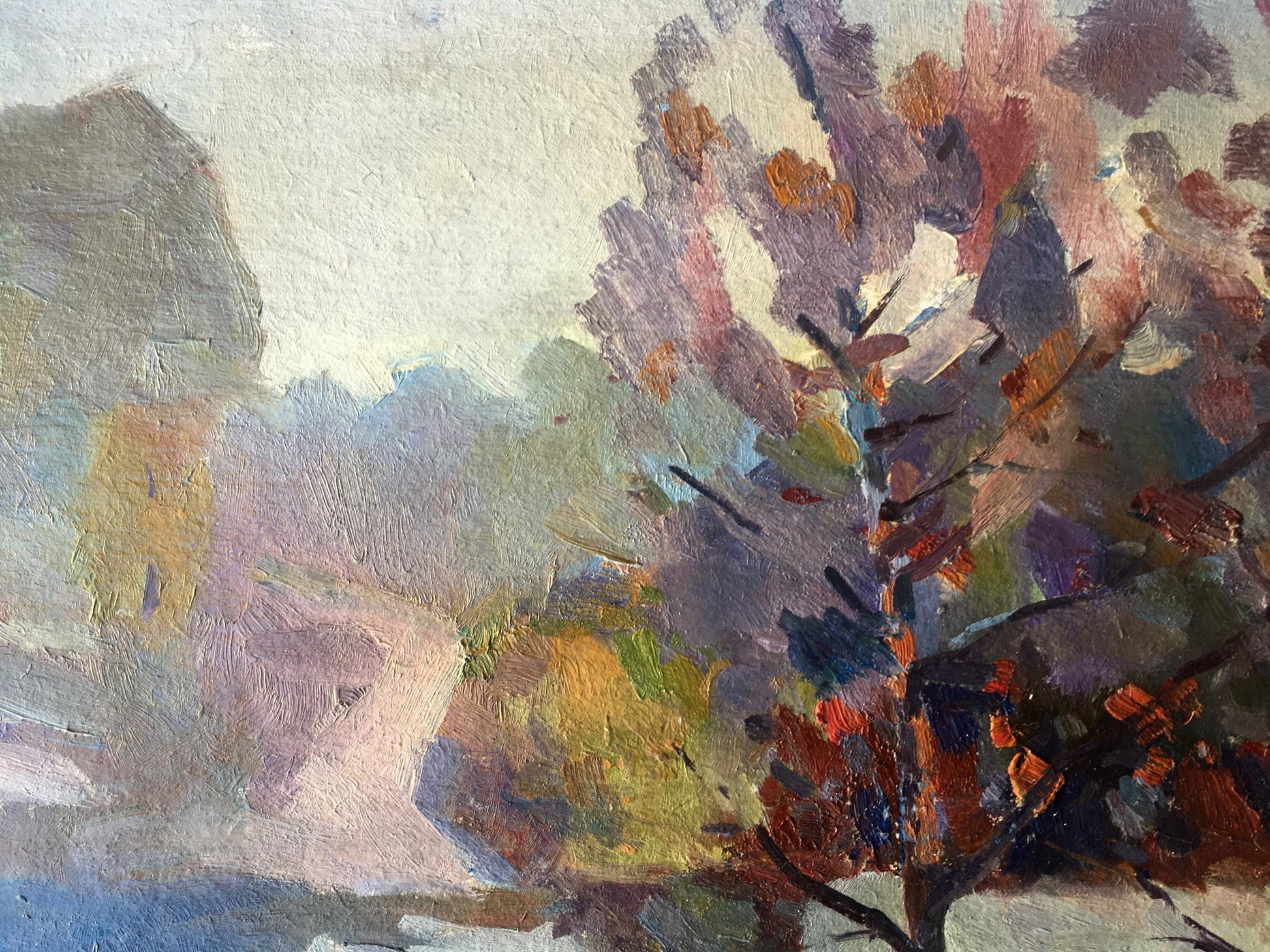 In Dobrev's artwork, he portrays the peaceful flow of a stream amidst lush woodland